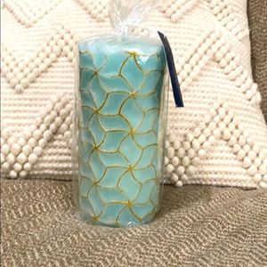 Abstract blue and gold candle